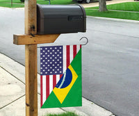 Garden flag on a yard stake: US stars and stripes with diagonal Brazil flag section