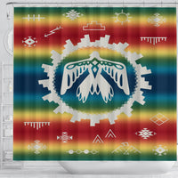 Rainbow Native shower curtain with sun and cross icons plus central blue feather emblem