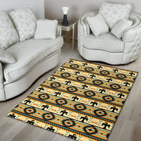 Yellow patterned area rug with black accents and repeating Native American motifs