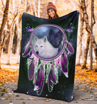 Wolf dreamcatcher blanket with purple-toned feathers and two wolves in a heart frame