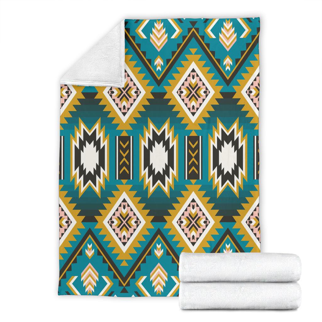 Turquoise multicolor Native American-style blanket with geometric diamonds and zigzag trim