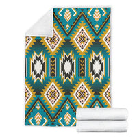 Turquoise multicolor Native American-style blanket with geometric diamonds and zigzag trim
