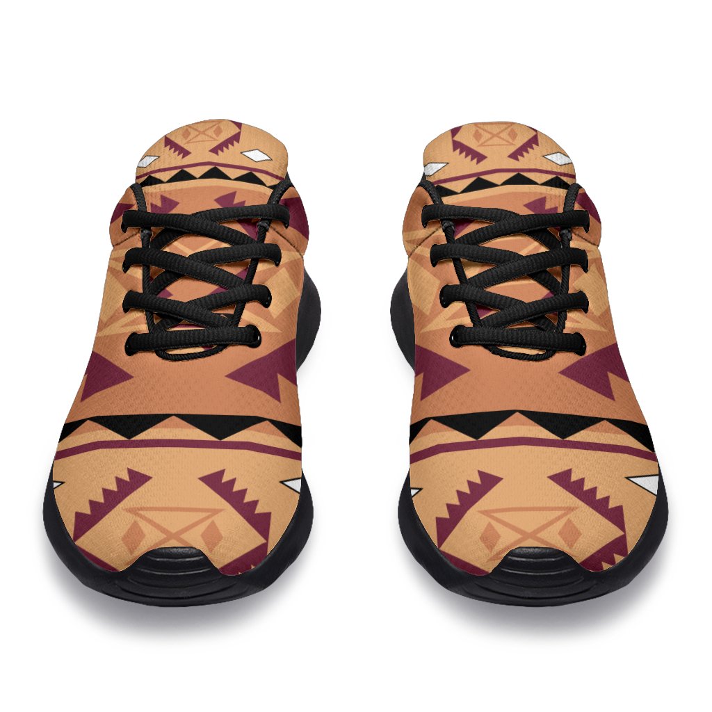 Front view native-style geometric sneakers in tan/purple/pink with black laces