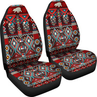 Car seat cover pair, front view of back panels and seat bottoms with red teal geometric bison