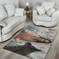 Area rug with woman's portrait and black wolf, soft blue-gray tones