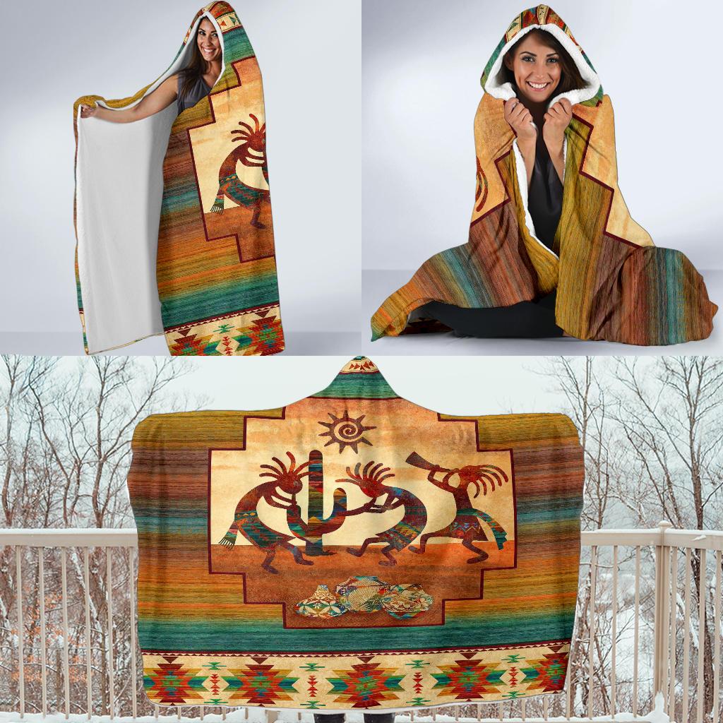 Multicolor hooded blanket with Kokopelli scene; hood at top and colorful border