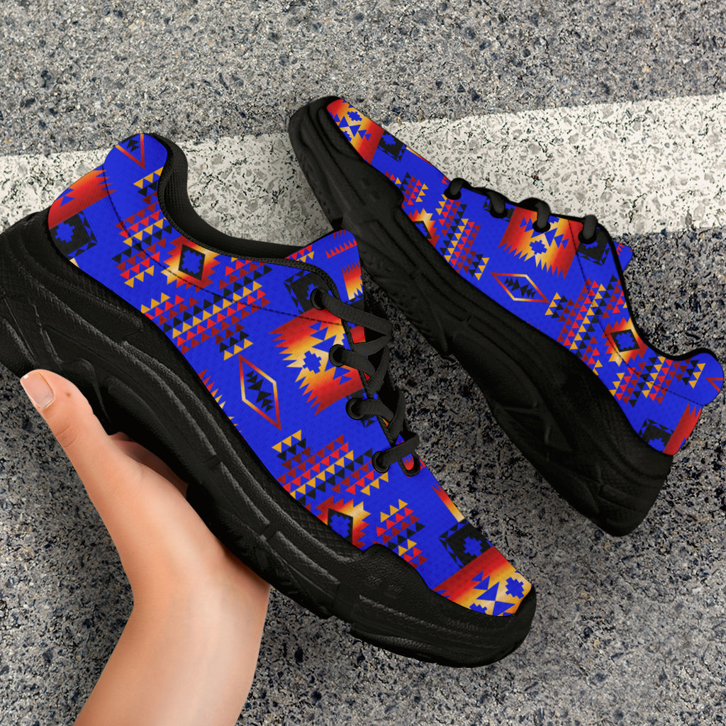 Dark blue chunky sneakers with multicolor Native American pattern and black sole