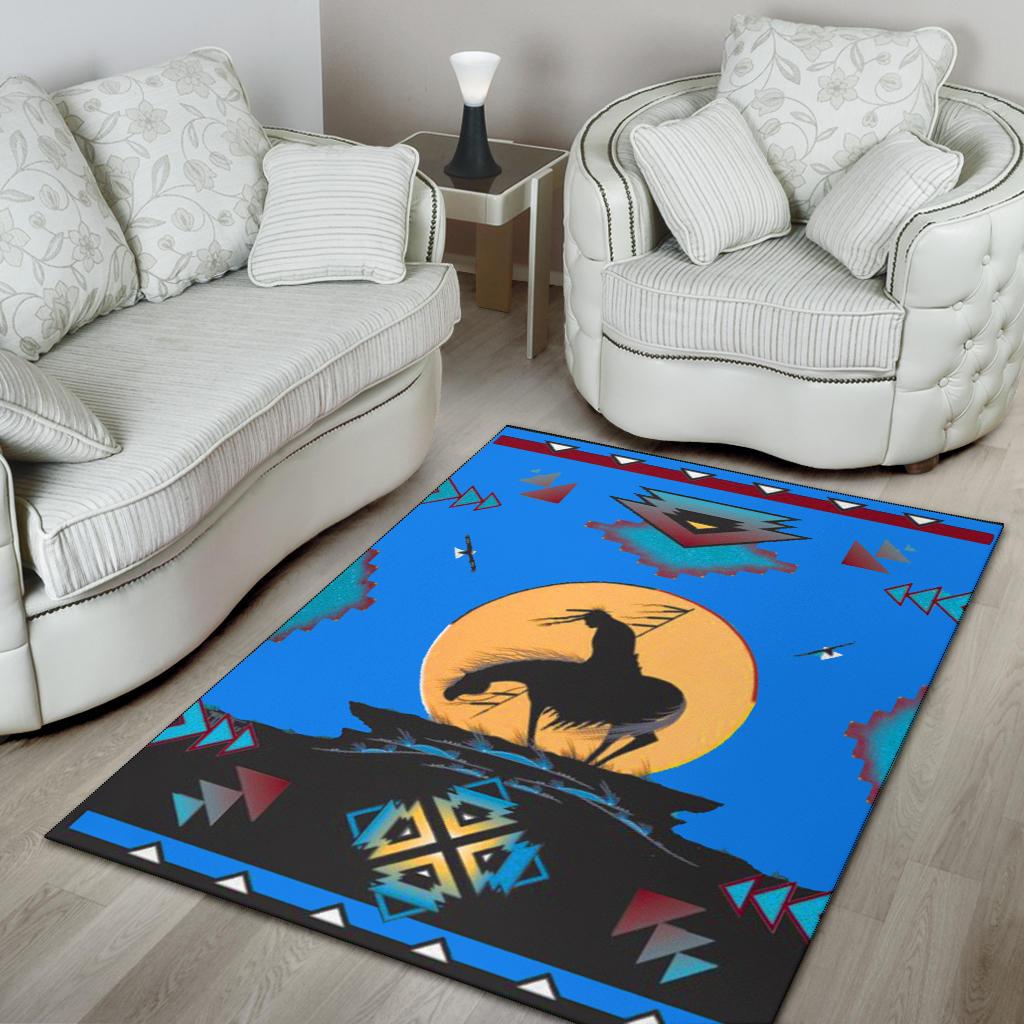 Blue area rug with black horse silhouette, yellow sun disk, and red, teal, and white geometric designs
