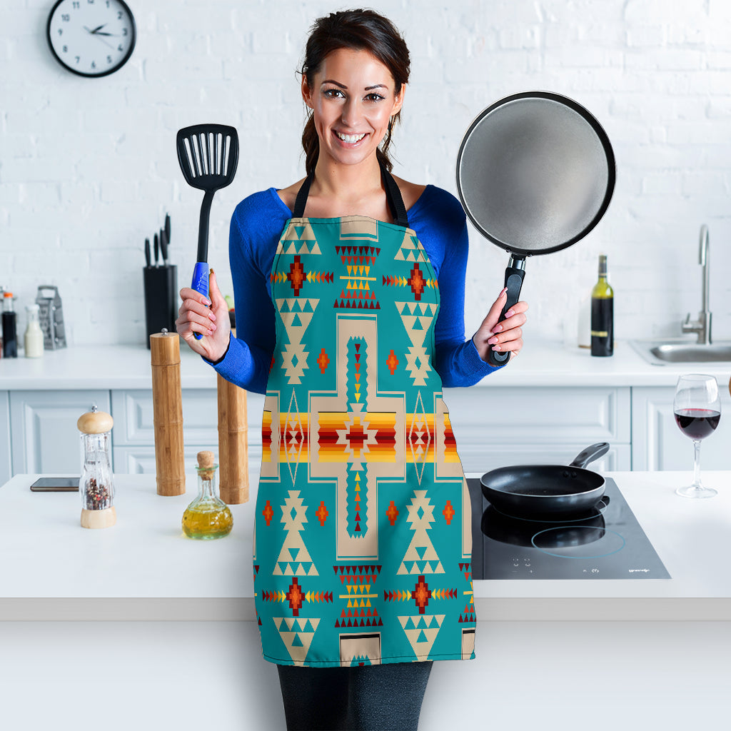 Apron worn front view: turquoise native geometric design with black tie straps