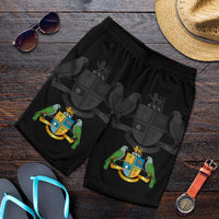 Black Dominica shorts with elastic waistband and crest-bird graphic, folded view