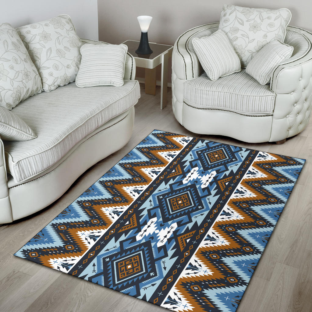Colorful tribal area rug with bold navy border, arrows and geometric center motifs