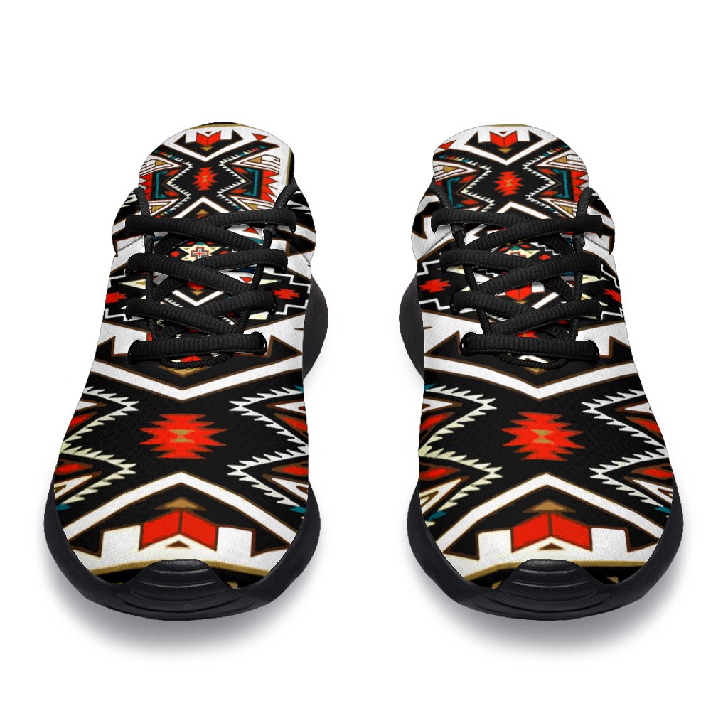 Pair of tribal patterned sneakers showing toe caps and black lace-up upper