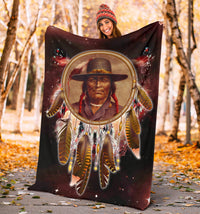Chief Dream Catcher Red Galaxy Blanket held outdoors, red galaxy dreamcatcher print