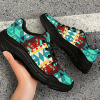 Native American pattern chunky sneakers, close side view, black sole and black laces
