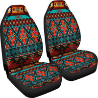 Two car seat covers with multicolor Native American patterns and black seat base