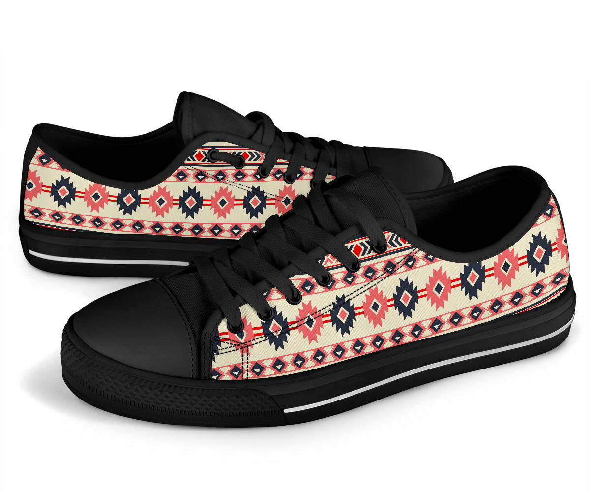 Black low-top lace-up sneakers with pink Aztec pattern vamp and white midsole stripe
