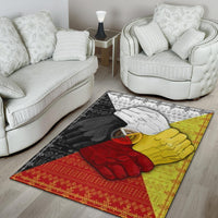 Medicine wheel hand area rug with red, yellow, black and white hand design