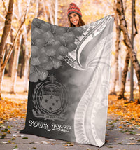 Black premium blanket with floral crest, sail pattern, and 'YOUR TEXT' lettering