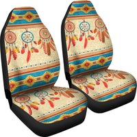 Pair of multicolor dreamcatcher seat covers with bold stripe trim and red feather motifs