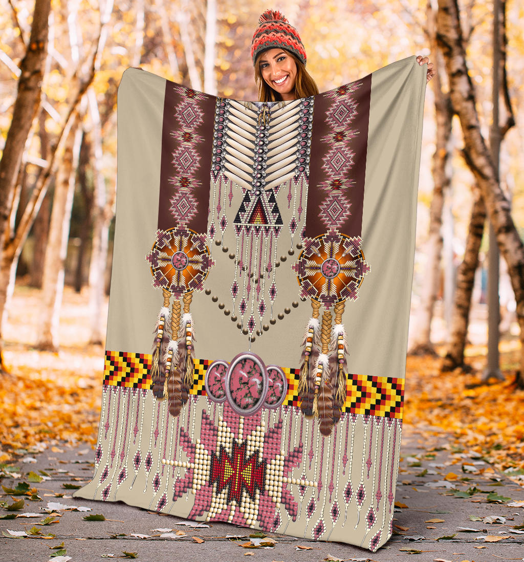 Beige breastplate blanket with maroon panels, beaded fringe, and pink central star