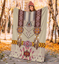 Beige breastplate blanket with maroon panels, beaded fringe, and pink central star