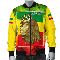 Front view of yellow/green/red bomber jacket featuring lion king portrait and flag colors
