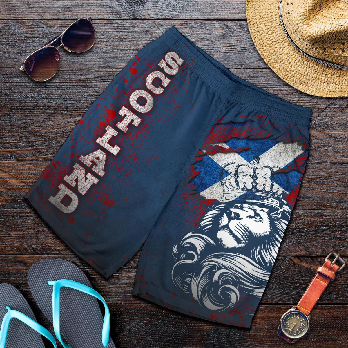 Blue men’s shorts with Scotland lion and crown print, ‘SCOTLAND’ text; elastic waistband