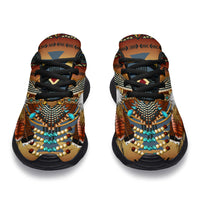 Front view sport sneakers, tan upper with beaded bib pattern, blue accents, black laces