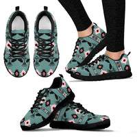 Set of Native-inspired turquoise sneakers: side, front, and outsole views with black trim