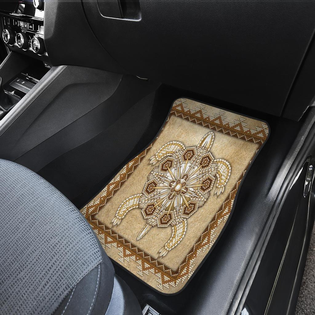 Beige beaded native-style front mat with ornate cross-and-floral medallion pattern