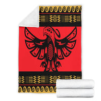 Red Native pride blanket set with black eagle design, gold trim, and folded white backing
