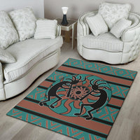 Turquoise and rust Kokopelli rug with black outline figure and multicolor geometric edge trim