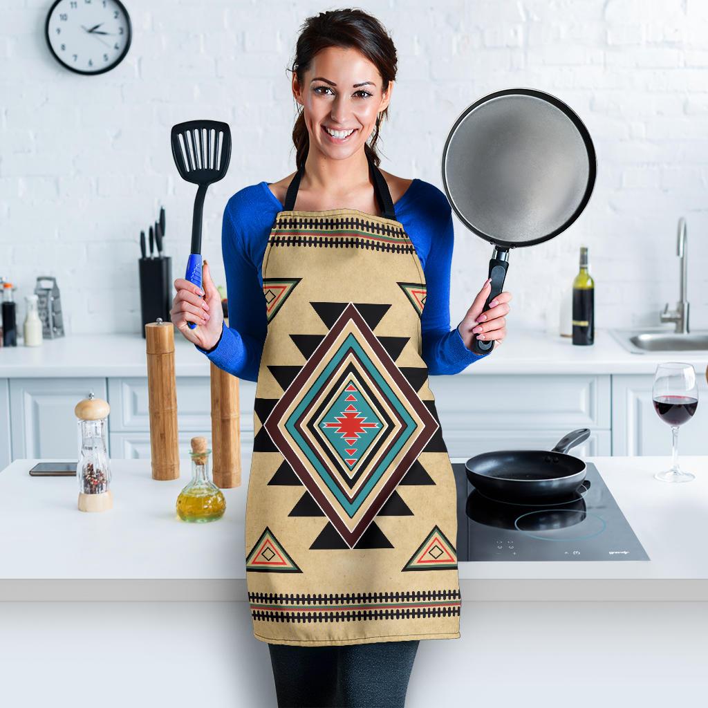 Beige canvas apron with large southwest diamond emblem and black neck straps