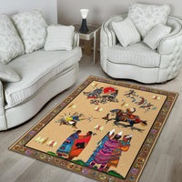 Beige Native American style area rug with colorful dancers, birds, and patterned border