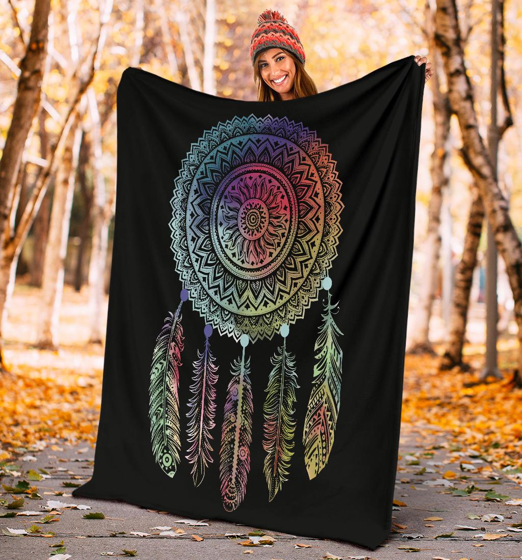 Black dreamcatcher throw draped, multicolor feathers and circular mandala graphic