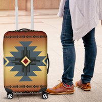 Luggage cover showing blue starburst and diamond emblem, elastic-like hem on wheels