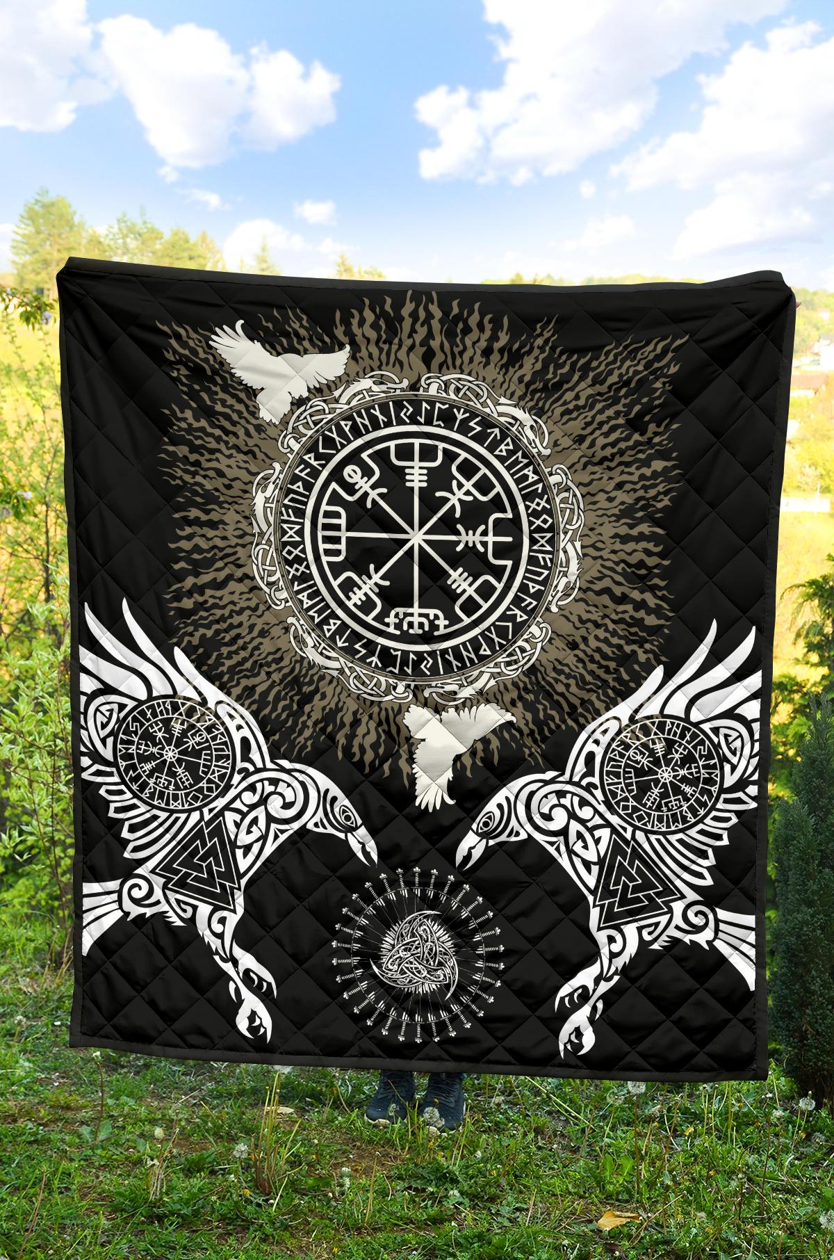 Black quilt with large circular Vegvisir/Valknut emblem, wing patterns, and quilted texture