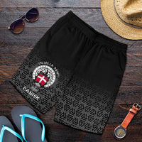 Black men’s shorts, folded, geometric pattern with Viking crest logo on front