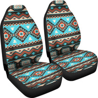 Turquoise tribal line and diamond car seat covers with black edges, two-piece set.