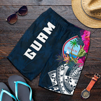 Men's blue Guam swim shorts with tropical print, elastic waist, 'GUAM' graphic