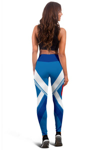 Back view of blue leggings with white chevron pattern and blocky color sections