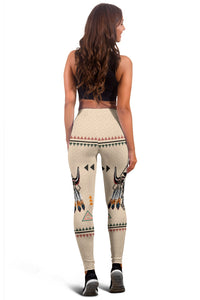 Women's leggings light tan with multicolor geometric bands and bison head motif
