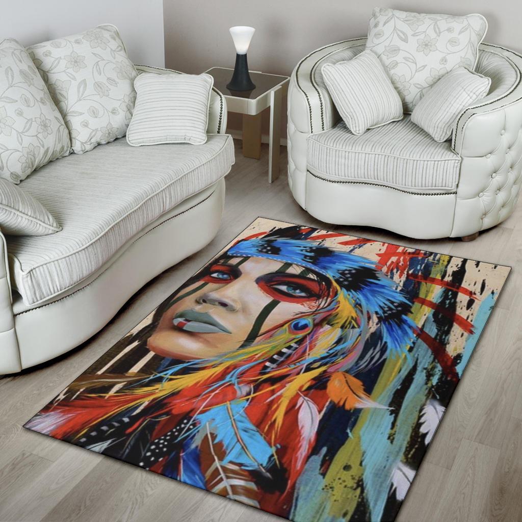 Multicolor area rug with full portrait artwork in bright blue, orange, red, and black