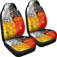 Two multicolor front seat covers with bold geometric bands and medicine wheel center design