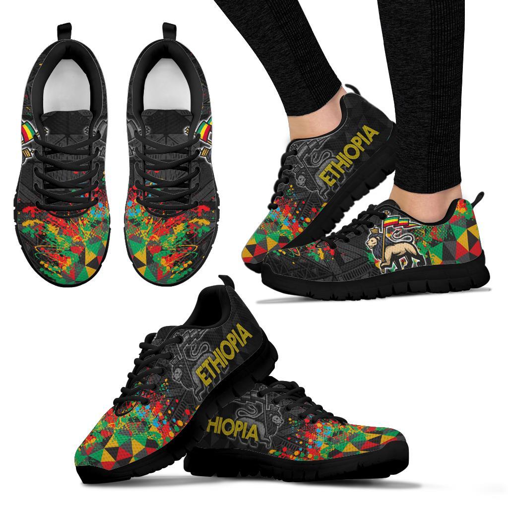 Black Ethiopia sneakers shown front and side views, colorful geometric panels, lace-up