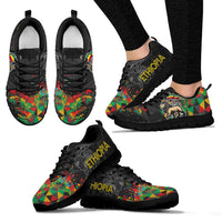 Black Ethiopia sneakers shown front and side views, colorful geometric panels, lace-up
