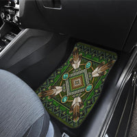 Green front car mat with turquoise bead ring, white feathers, and mandala center design
