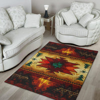 Geometric area rug with red, yellow and green tribal pattern and dark edge on light floor