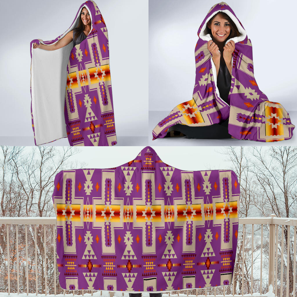 Front-view hooded blanket with purple and orange geometric pattern, hood up and wrapped
