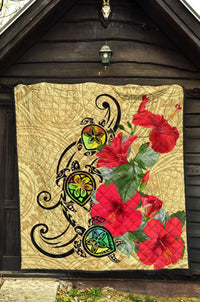 Beige premium quilt with black turtle artwork, green highlights, and red hibiscus